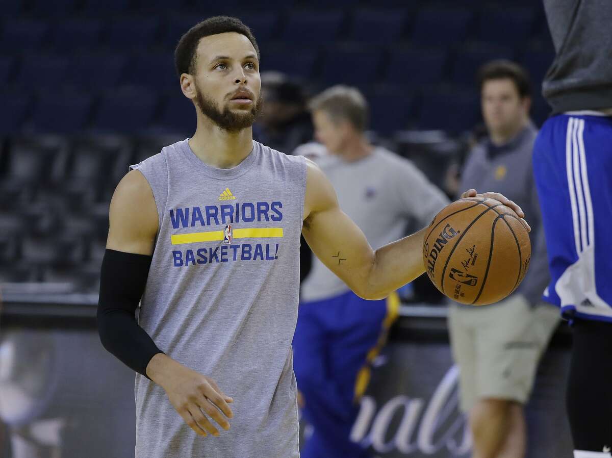 Golden State Warriors' Stephen Curry dribbles during an NBA basketball practice, Wednesday, May 31, 2017, in Oakland, Calif. The Golden State Warriors face the Cleveland Cavaliers in Game 1 of the NBA Finals on Thursday in Oakland. (AP Photo/Marcio Jose Sanchez)