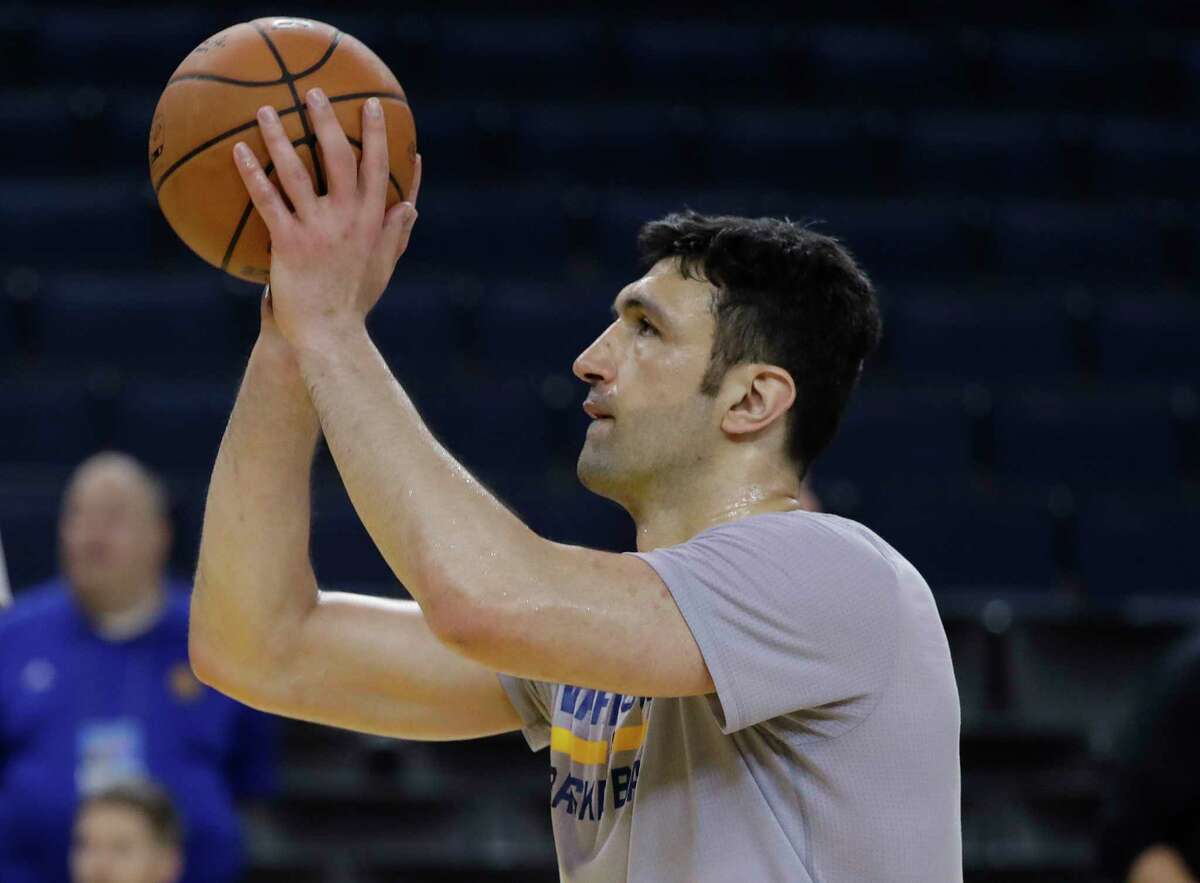 Golden State Warriors' Zaza Pachulia shoots during an NBA basketball practice, Wednesday, May 31, 2017, in Oakland, Calif. The Golden State Warriors face the Cleveland Cavaliers in Game 1 of the NBA Finals on Thursday in Oakland. (AP Photo/Marcio Jose Sanchez)