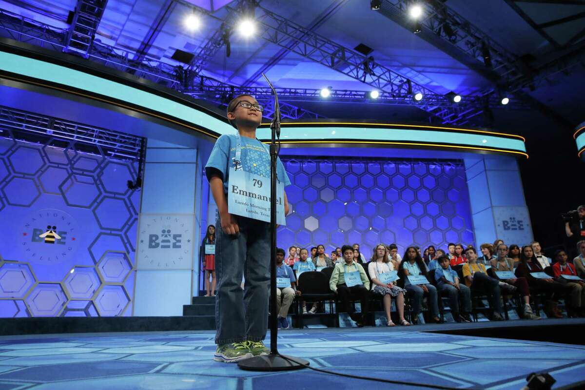 Emmanuel Rimocal, 9, of Laredo, Texas, spells his word in the 90th Scripps National Spelling Bee in Oxon Hill, Md., Wednesday, May 31, 2017.