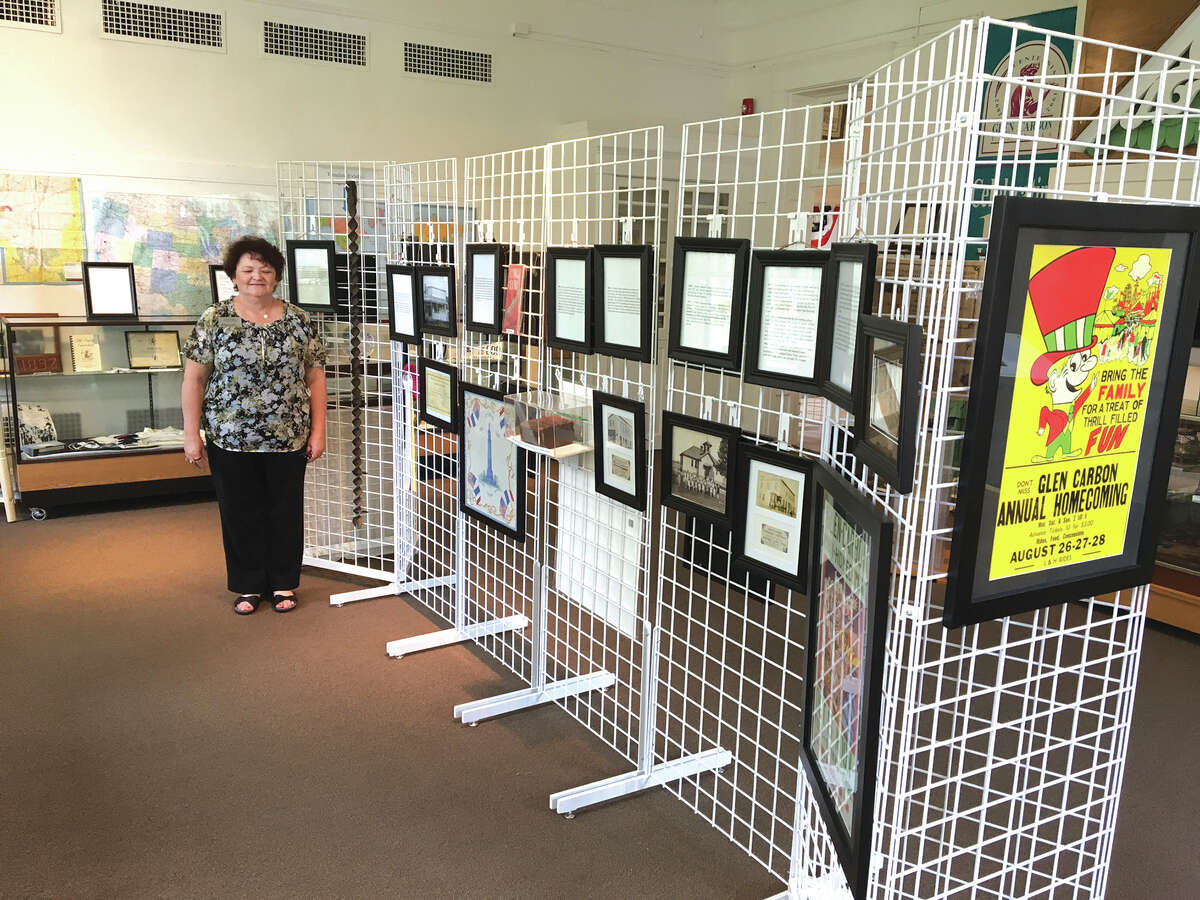 Glen Carbon Heritage Museum Coordinator Linda Sinco stands by the newest display at the Museum. Sinco created a special display of the history of Glen Carbon in celebration of the Village’s 125th Anniversary.