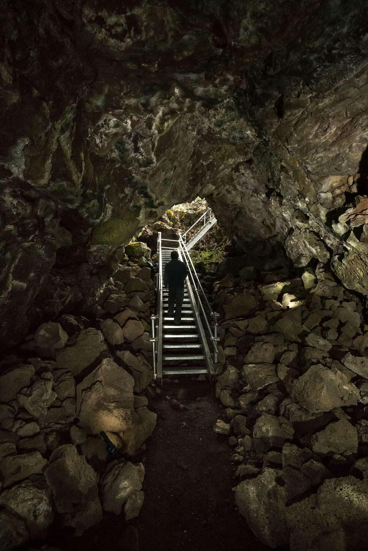 Metal stairs provide access to the Merrill cave in the Lava Beds National Monument on Wednesday, May 31 2017 in Siskiyou County, CA.