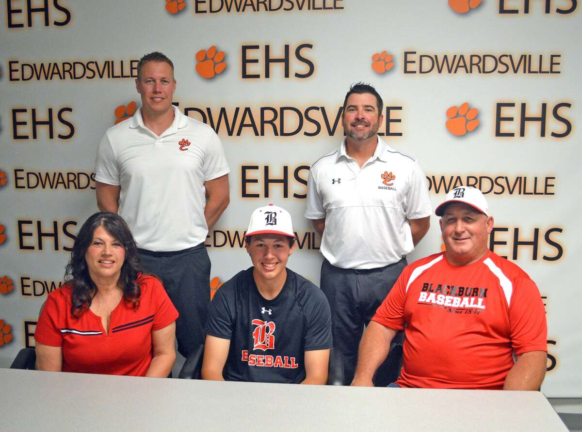 Edwardsville senior Isaac Garrett will play baseball and golf at Blackburn College. In the front row, from left to right, are mother Angie Garrett, Isaac Garrett and father Don Garrett. In the back row, from left to right, are EHS boys’ golf coach Adam Tyler and EHS baseball coach Tim Funkhouser.