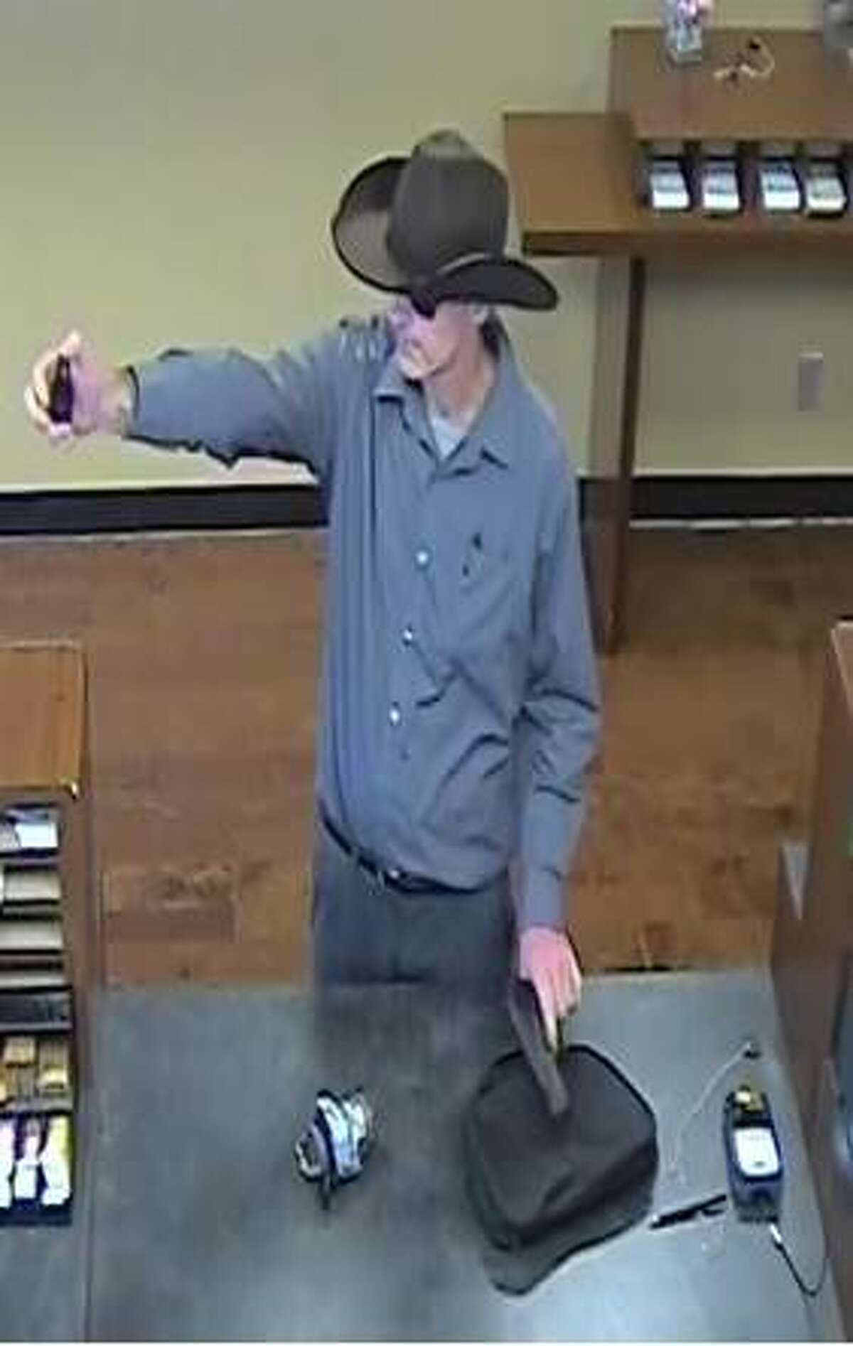 The FBI Thursday released two photos of a wanted would-be bank bandit. 