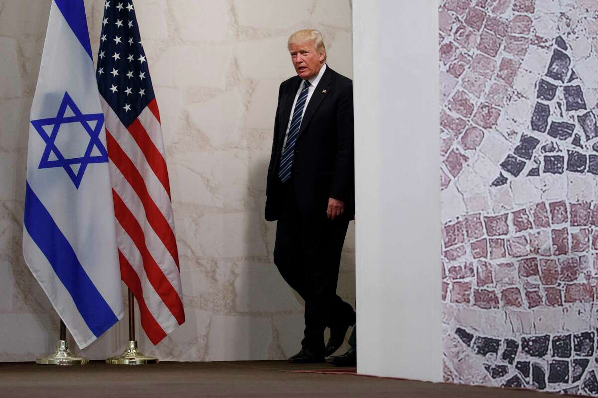 FILE - In this May 23, 2017 file photo, President Donald Trump arrives to speak at the Israel Museum in Jerusalem. A senior Israeli official is expressing disappointment over TrumpÂs decision against relocating the embassy to Jerusalem and is accusing the U.S. of caving in to Arab pressure. (AP Photo/Evan Vucci, File)