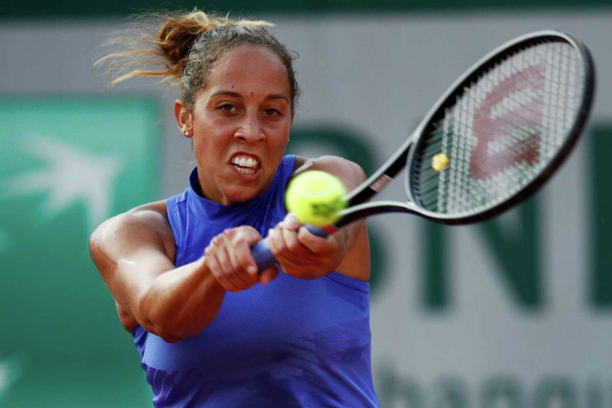 American Madison Keys leans into a backhand during her second-round match. However, a surgically repaired left wrist hampered her play.