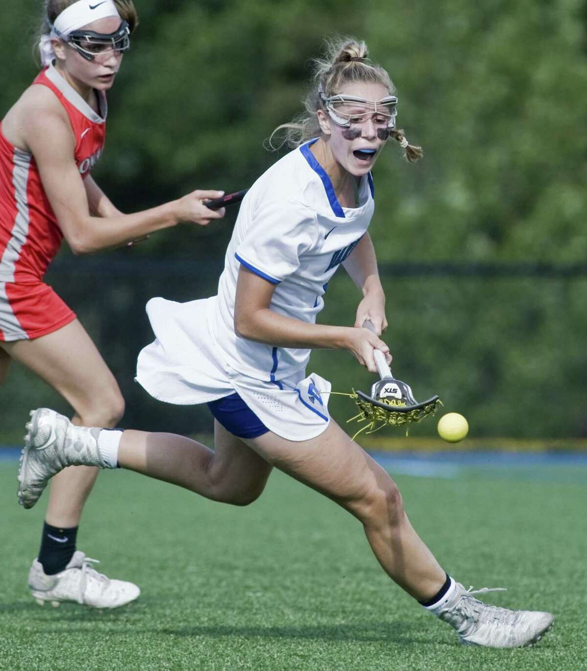 Darien High School's Emma Jaques chases a loose ball in the Class L girls lacrosse game against Conard High School, played at Darien. Thursday, June 1, 2017