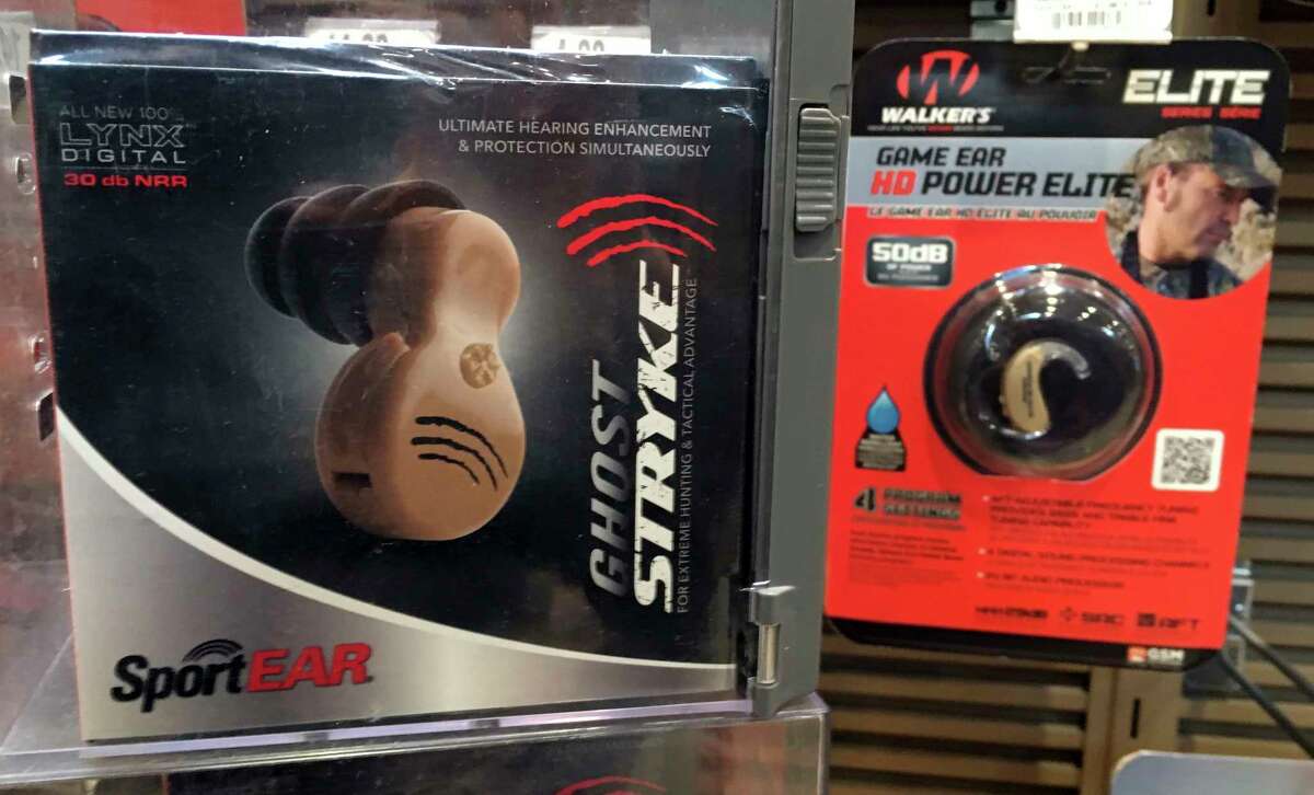 Hearing enhancement devices are displayed at a hunting store Thursday, June 1, 2017, in Scarborough, Maine. The group Guns Owners of America says a push by Sens. Elizabeth Warren and Susan Collins to get more hearing aids to people is not about hearing aids at all. They says it's a covert attempt to get more regulation of firearm products such as hearing enhancement devices used by hunters. (AP Photo/Robert F. Bukaty)