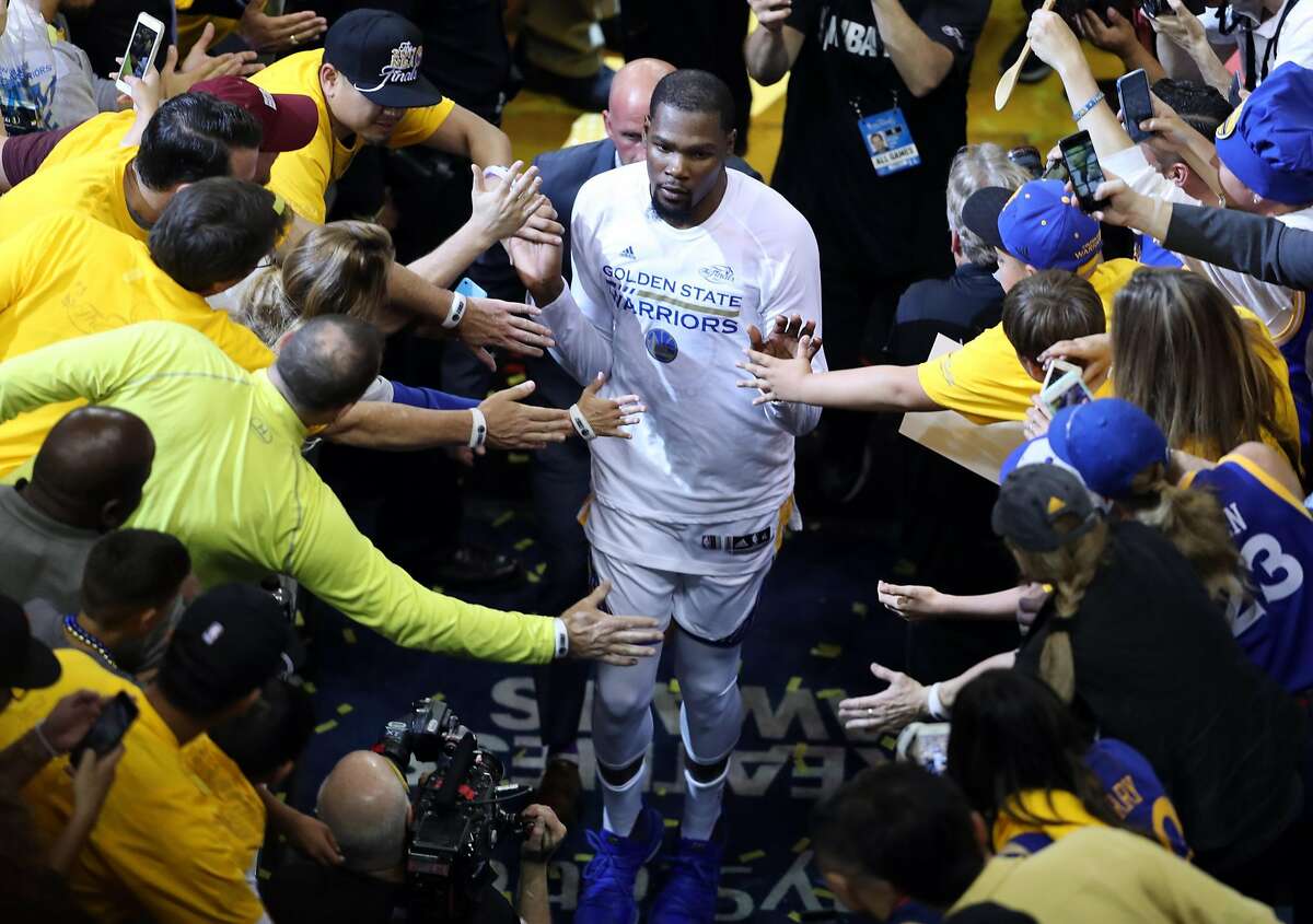 Golden State Warriors' Kevin Durant leaves court after scoring 38 points against Cleveland Cavaliers during Warriors' 113-91 win in Game 1 of the NBA Finals at Oracle Arena in Oakland, Calif., on Thursday, June 1, 2017.