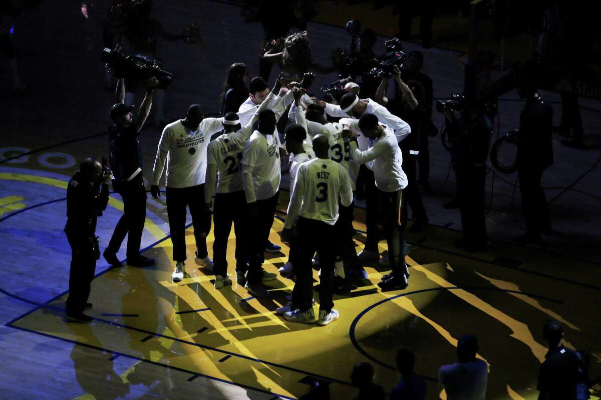 The Golden State Warriors huddle before the start of the first quarter of the NBA Finals Game 1 between the Golden State Warriors and the Cleveland Cavaliers on Thursday, June 1, 2017, at Oracle Arena in Oakland, Calif.