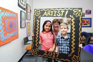 Retiring Stamford teacher passes annual art show to daughter