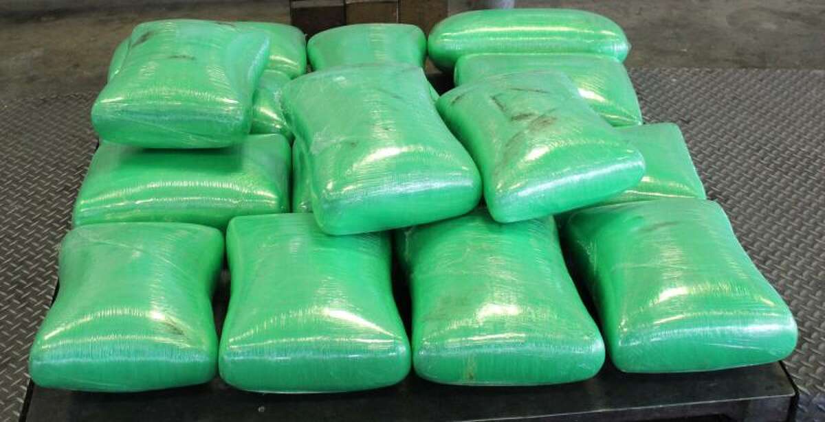 Packages containing 655 pounds of marijuana seized by CBP officers at Pharr International Bridge in shipment of jalapeños.
