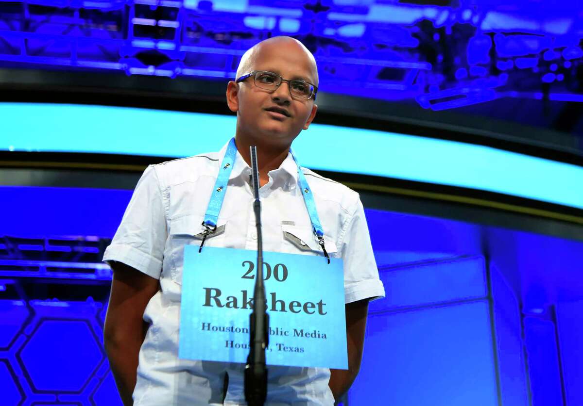 Raksheet Kota, 14, from Katy, Texas, spells his word during the finals of the 90th Scripps National Spelling Bee, in Oxon Hill, Md., Thursday, June 1, 2017. Kota, correctly spelled his word. (AP Photo/Manuel Balce Ceneta)