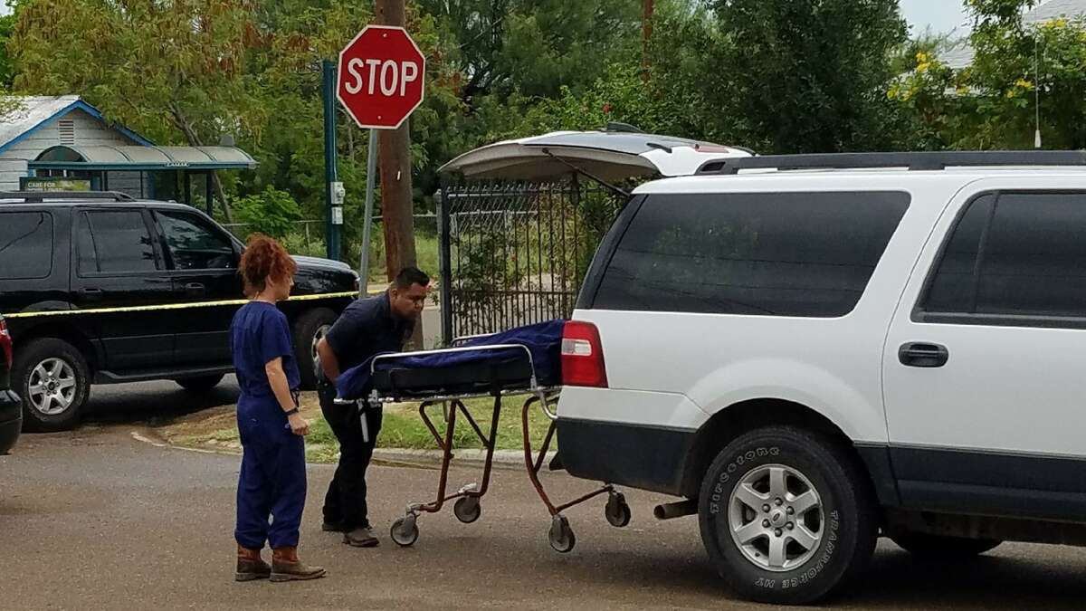 The Webb County Medical Examiner's Office takes custody of the body of a woman who police believe was killed by her boyfriend. Laredo police found her fatally shot Friday morning after conducting a welfare concern check in the 400 block of East Travis Street. Police said they wanted to question her boyfriend in connection with the slaying. Officers later encountered him at a convenience store. The man allegedly opened fire on the officers. He was killed while three officers were wounded.