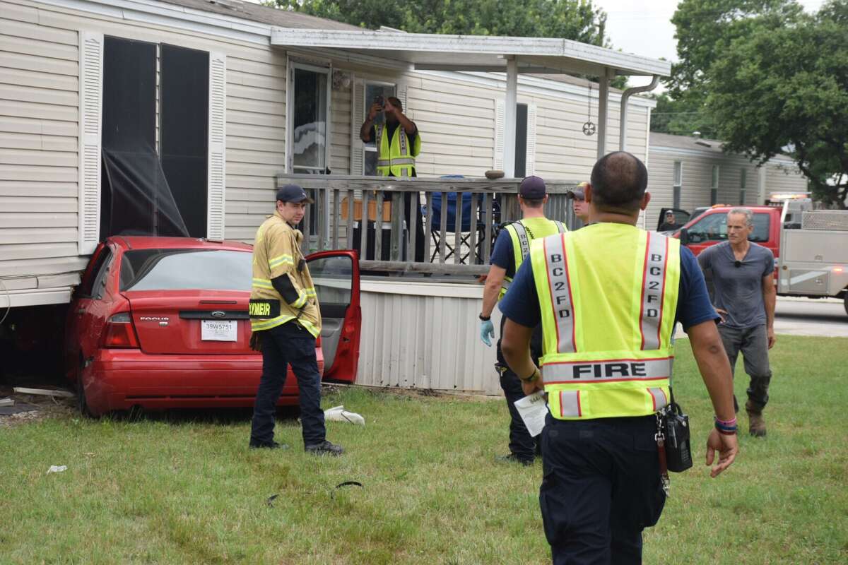 A woman was hospitalized Friday, June 2, 2017, after losing control of her vehicle and crashing into a West Side mobile home.