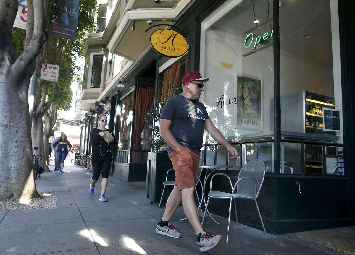 Pedestrians walk on Hayes Street in San Francisco, Calif. on Friday, June 2, 2017. The Hayes Valley neighborhood west of the Civic Center has one of the highest rated walk scores in the city.