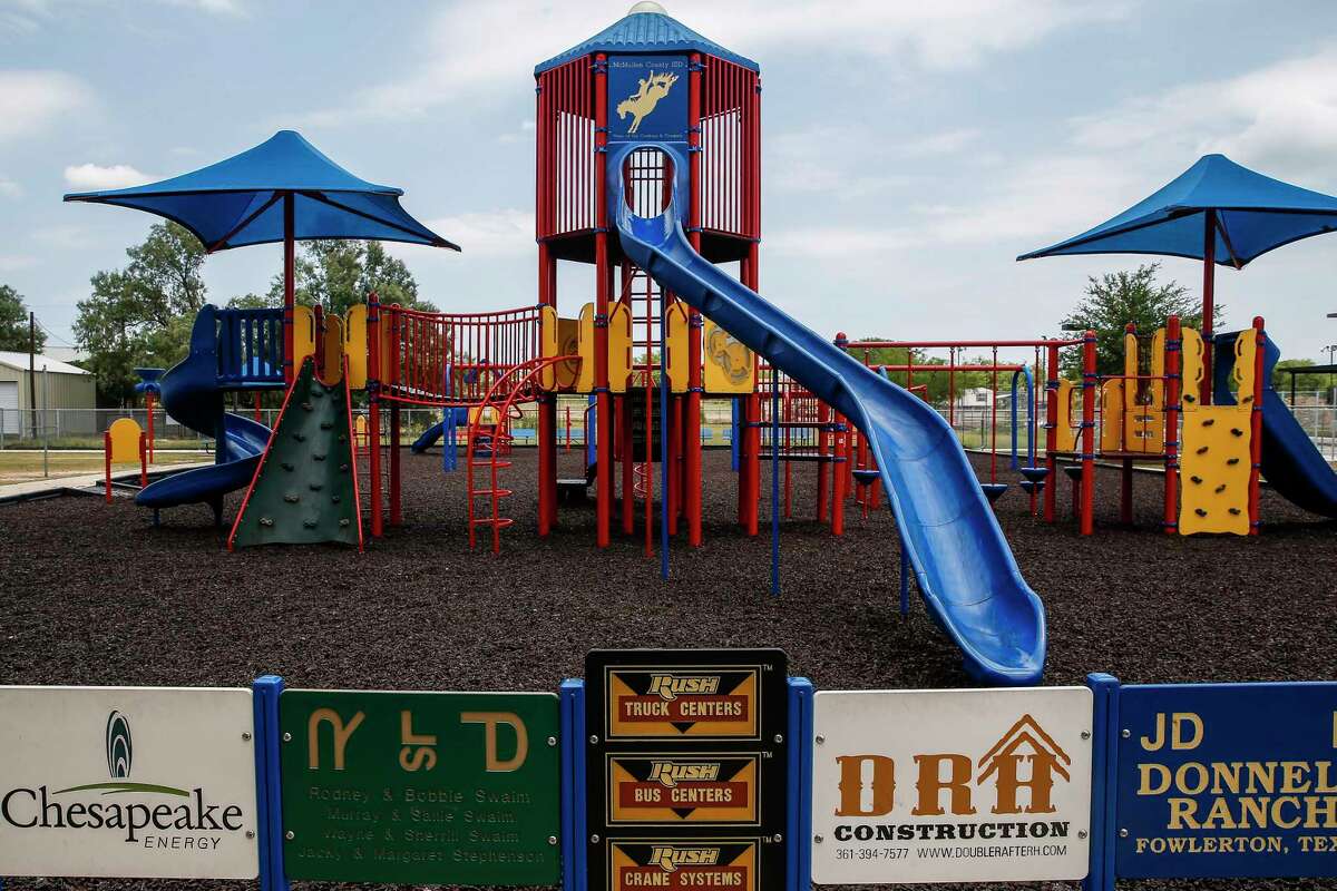 Names of sponsors line a playground at McMullen County ISD Tuesday, May 23, 2017 in Tilden, the county seat of McMullen County. McMullen County, a county of only about 800 residents, had the highest average gross income in the country in 2015. ( Michael Ciaglo / Houston Chronicle )