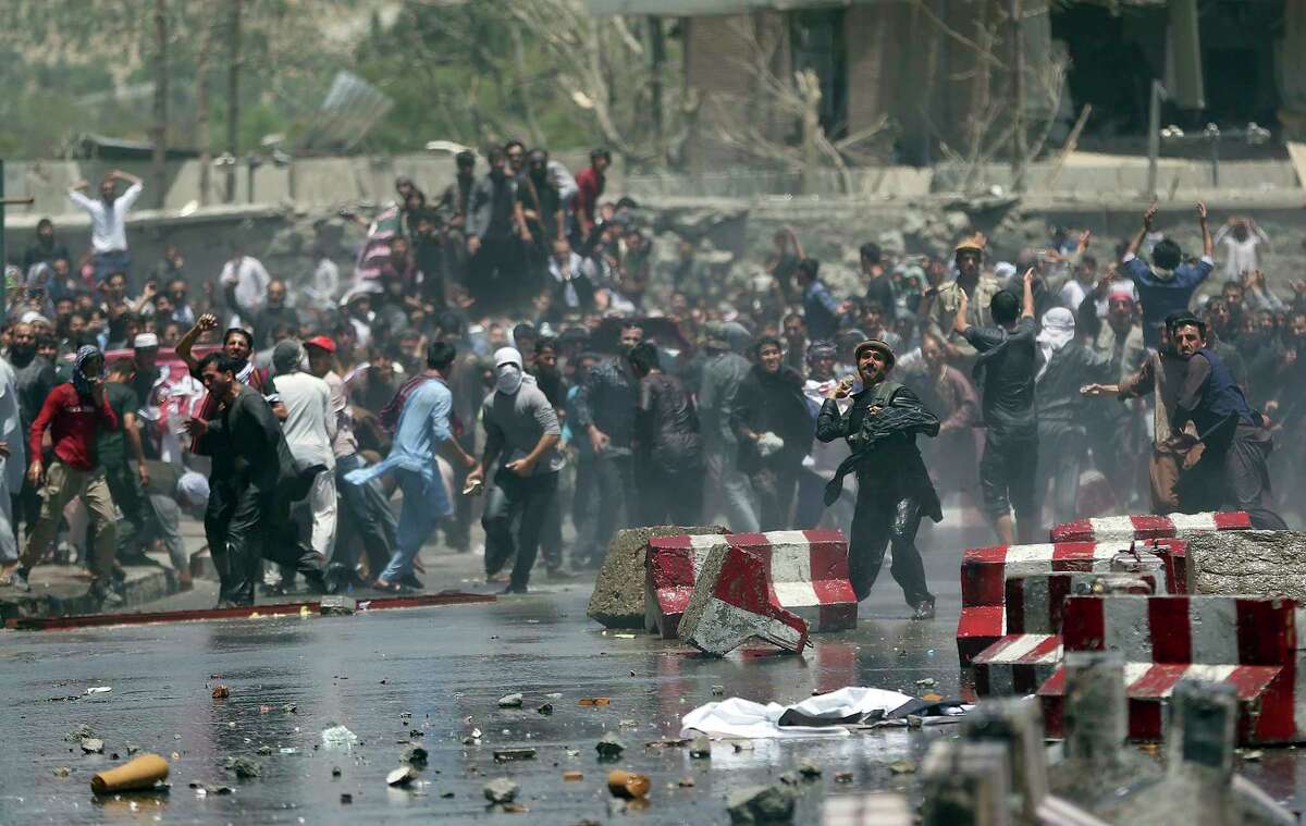 ﻿Demonstrators and police clashed Friday in Kabul amid a protest, attended by more than 1,000 people, demanding better security after a truck bomb attack Wednesday.
