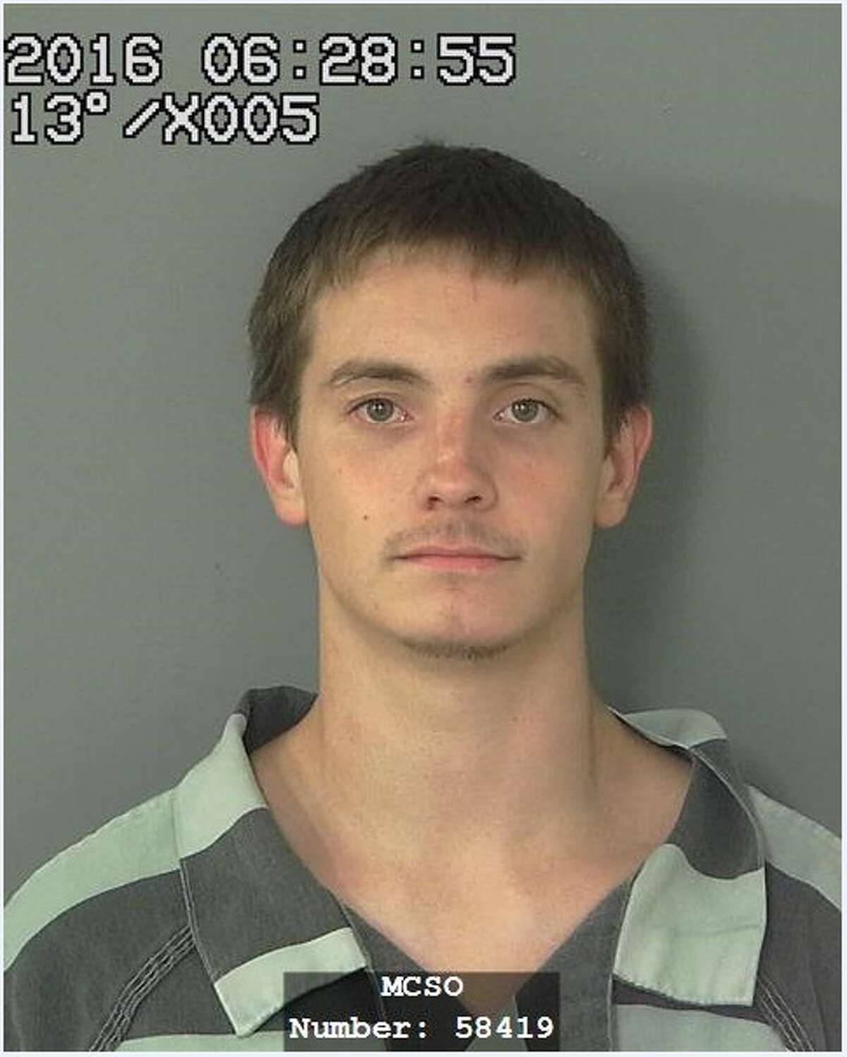 Joshua Allen Coker, 23, is wanted for starting a fire at a home in the 28100 block of Ivy Oaks Lane near Splendora.