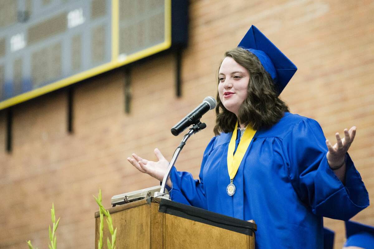 Graduate Lauren Curtis gives her commencement speech, "A Letter to my Freshman Self," during the graduation ceremony on Friday at Midland High School.