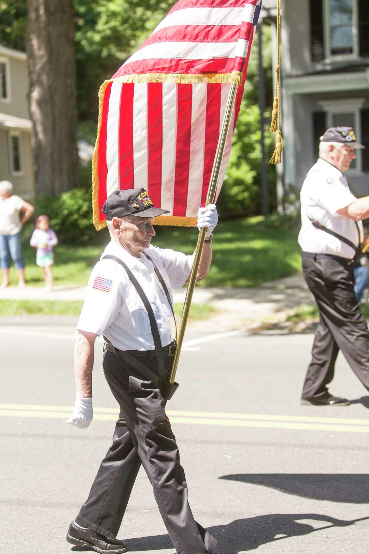 Korean War Veteran Howard Klump marches during the Bethel Memorial Day Parade last month in Bethel, Conn. (Christopher Burns/For Hearst Connecticut Media)