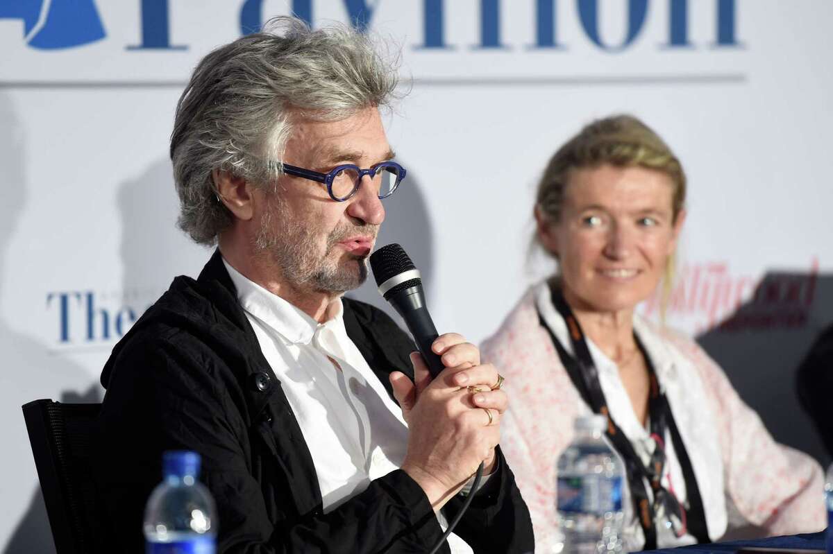 CANNES, FRANCE - MAY 25: Director Wim Wenders and Anne Facerias, Founder Festival Sacre de la Beaute attend the 'Responsibility of Filmmakers in making movies that matter' event during the 70th annual Cannes Film Festival at the American Pavillion on May 25, 2017 in Cannes, France. (Photo by Antony Jones/Getty Images)
