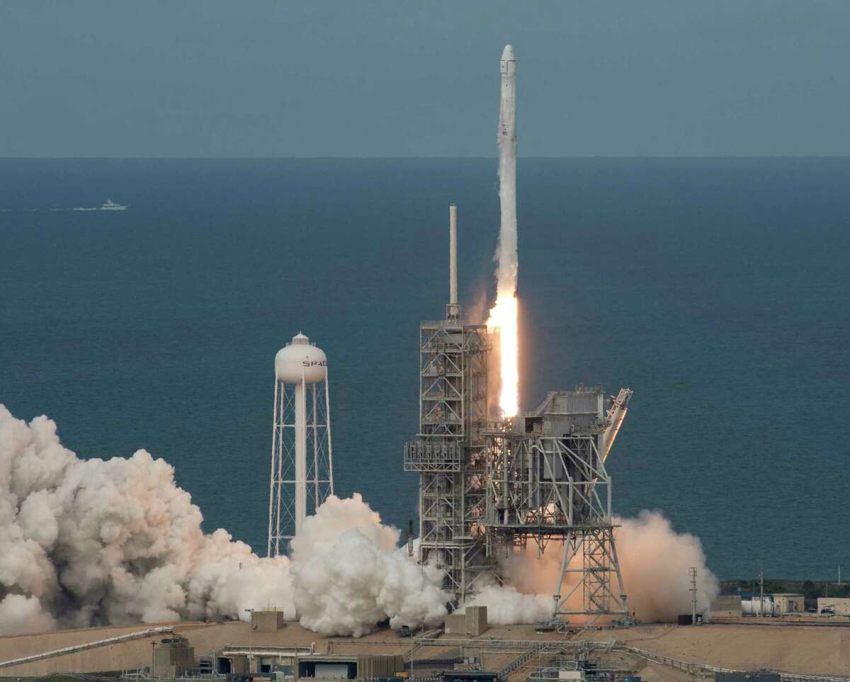 In this photo provided by NASA, the SpaceX Falcon 9 rocket, with the Dragon spacecraft onboard, launches from pad 39A at NASA's Kennedy Space Center in Cape Canaveral, Fla, Saturday, June 3, 2017. SpaceX launched its first recycled cargo ship to the International Space Station on Saturday, yet another milestone in its bid to drive down flight costs. (Bill Ingalls/NASA via AP)