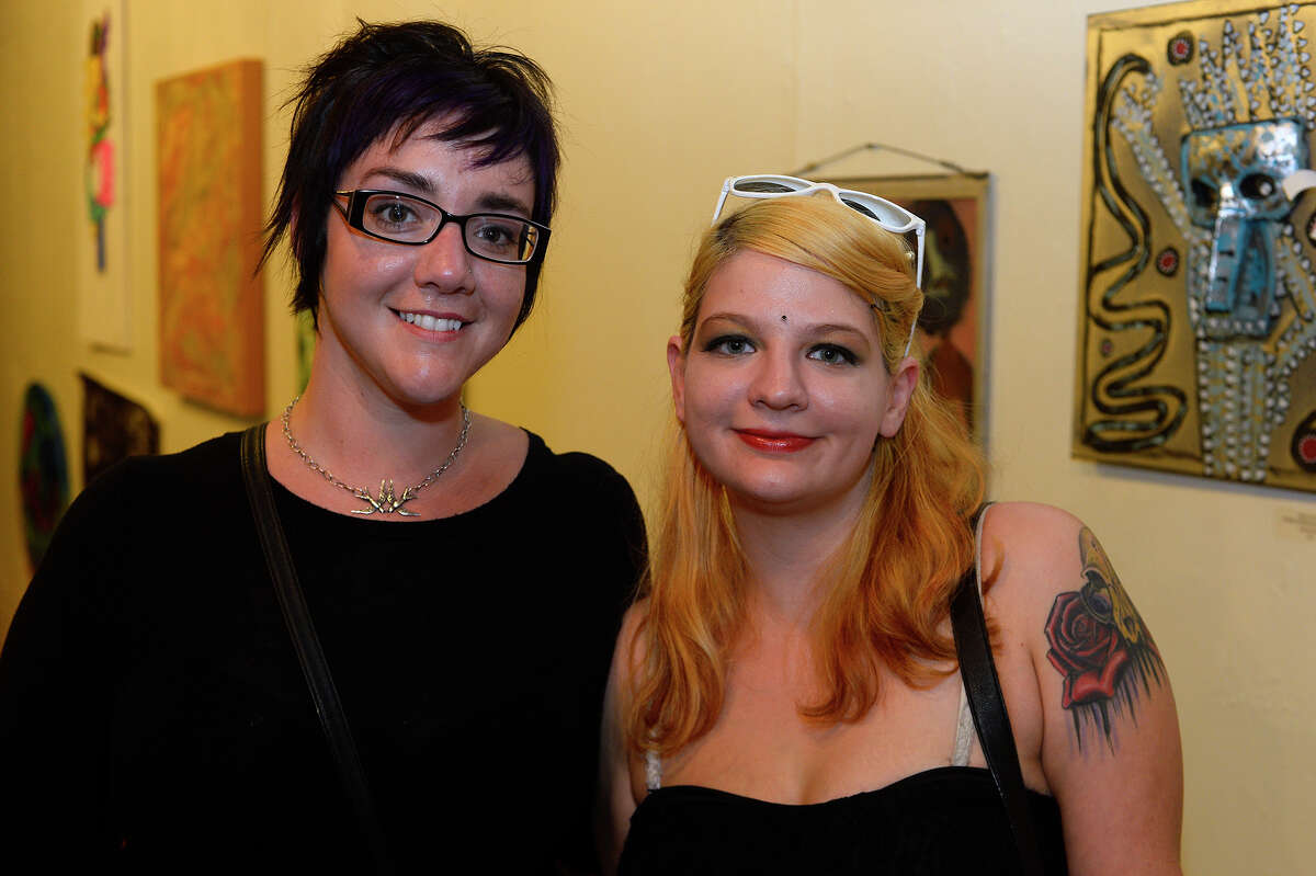 Sarah McDougle and Kristen Hill during The Art Studio, Inc.'s Alternative show on Saturday evening. The annual show was open to anyone who wanted to contribute art to be displayed. Photo taken Saturday 6/3/17 Ryan Pelham/The Enterprise