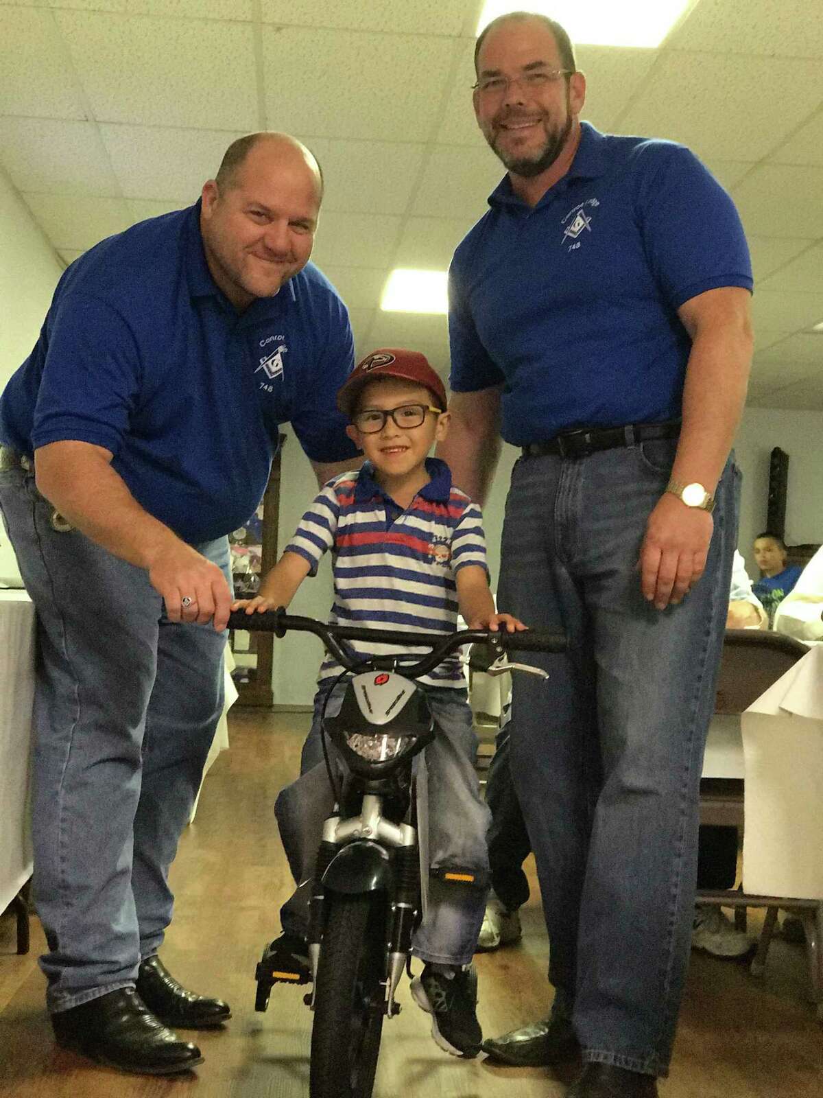 Armstrong and Reaves Elementary studentsÂ?’ names were drawn the first week of May among their peers as part of the Conroe Masonic Lodge #748Â?’s Â Books For Bikes Program. Jayden Sanchez eagerly hopped on his new red and black bike while his parents Raymundo and Rosie Sanchez and younger sister Jamia Sanchez attended the ceremony May 17. Lyria Lima was also happy to get her new pink set of wheels with her mother Tiffany Blas and older brother Jorge Perez there to see it.