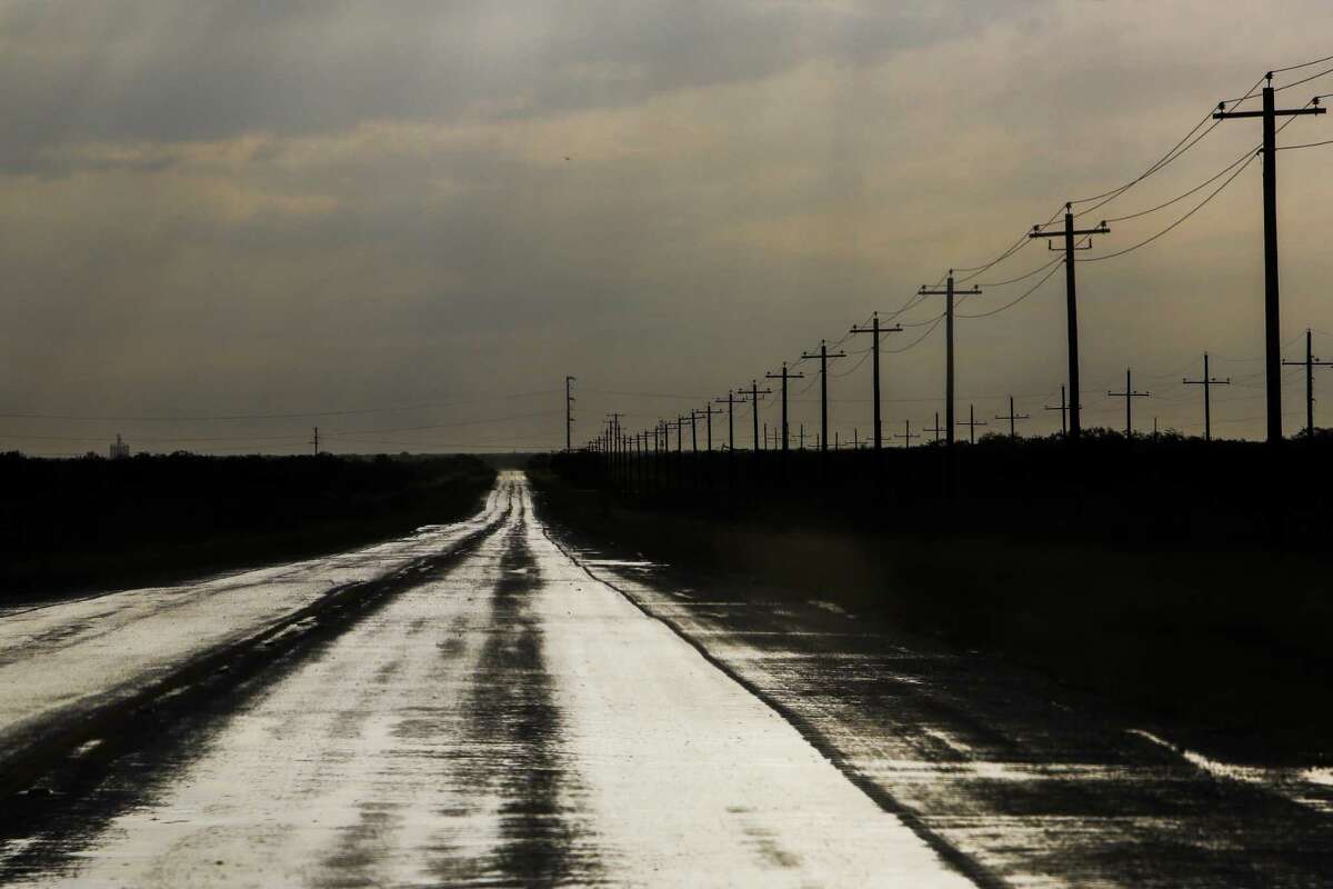 Texas-72 stretches into the distance after a storm Tuesday, May 23, 2017 in Tilden, the county seat of McMullen County. McMullen County had the highest average gross income in the country in 2015. ( Michael Ciaglo / Houston Chronicle )