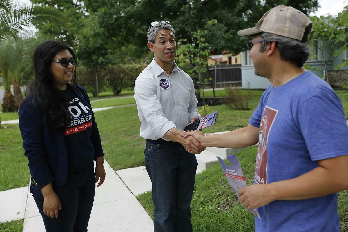 District 8 Councilman and mayoral candidate Ron Nirenberg (center) along with Deputy Campaign Manager Juany Torres (left) meet with Monticello Historic District homeowner John Hernandez while blockwalking in the neighborhood on Saturday, June 3, 2017. Nirenberg is in a runoff for the Mayor's office against current city mayor Ivy Taylor. (Kin Man Hui/San Antonio Express-News)