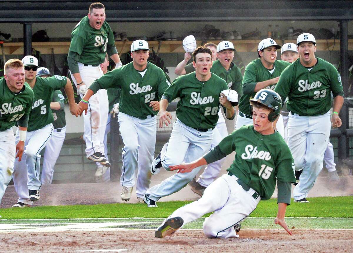 Shen's #15 Kyle Douglas slides in to score the go ahead run during their win over Webster Schroeder for the Class AA state championship Saturday June 11, 2016 in Binghamton, NY. (John Carl D'Annibale / Times Union)