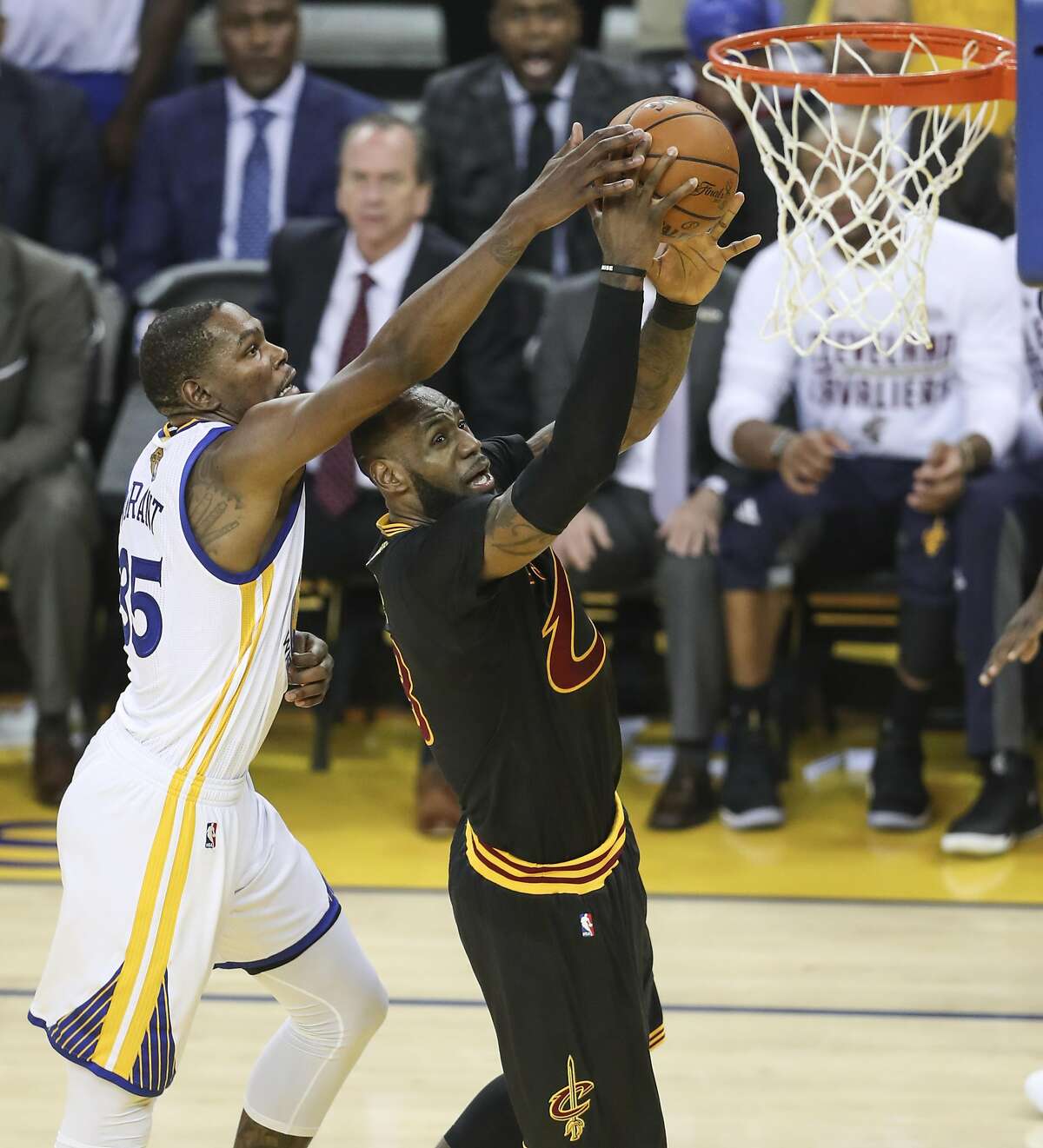 Golden State Warriors' Kevin Durant tries to stop Cleveland Cavaliers' LeBron James in the second quarter during Game 2 of the 2017 NBA Finals at Oracle Arena on Sunday, June 4, 2017 in Oakland, Calif.