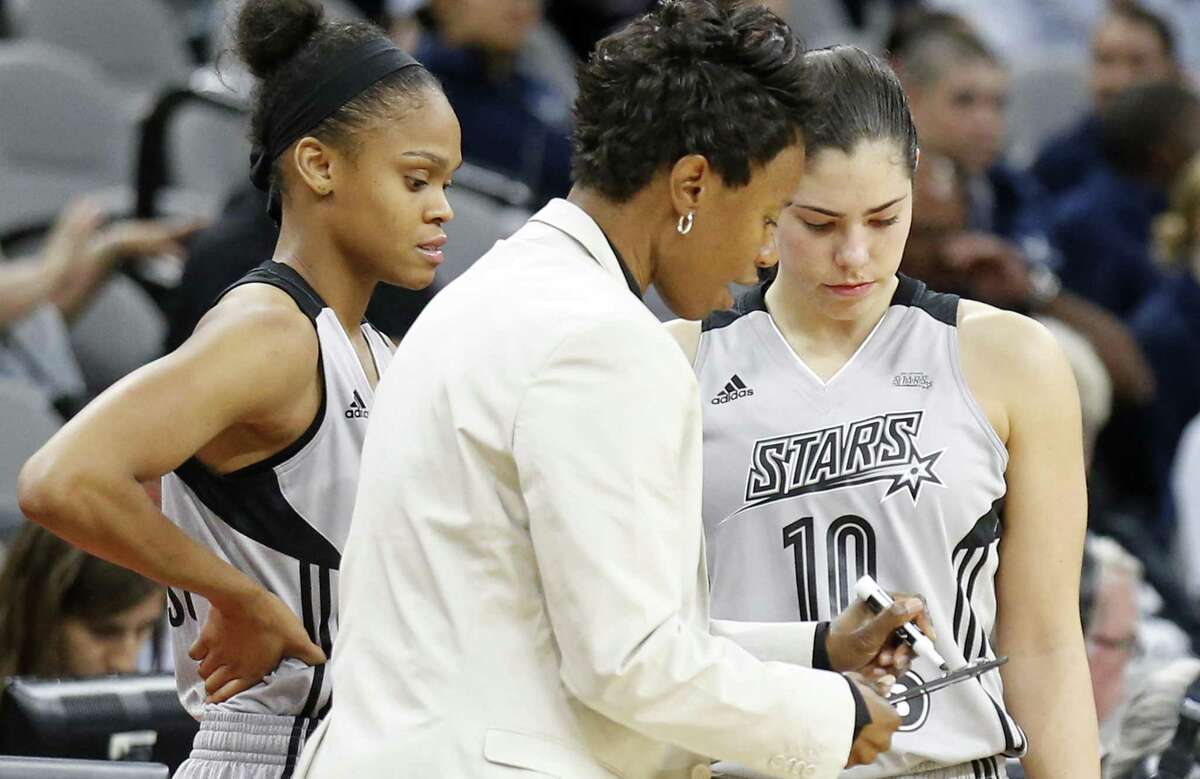 Stars head coach Vickie Johnson talks with Moriah Jefferson (left) and Kelsey Plum during second half action against the Connecticut Sun on June 3, 2017 at the AT&T Center.