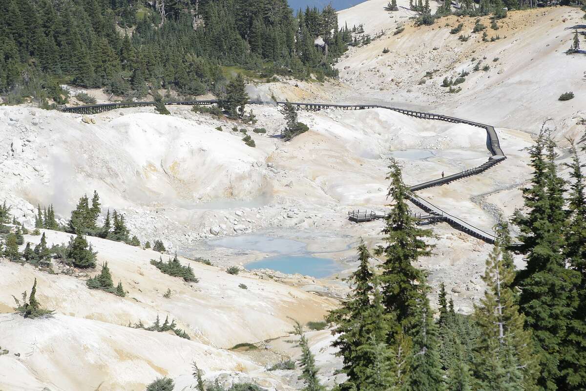 Trail climbs a short ridge to this overlook of the Bumpass Hell geothermal area.