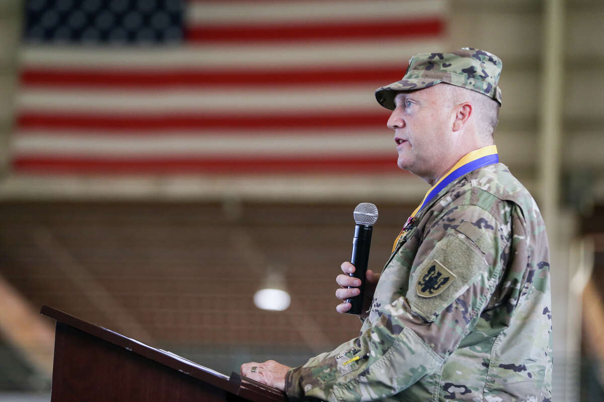 Lt. Col. Edmund Naughton speaks during the 1-158th Aviation Regiment's Change of Command and Change of Responsibility Ceremony on Sunday, June 4, 2017, at the Montgomery County Fairgrounds.