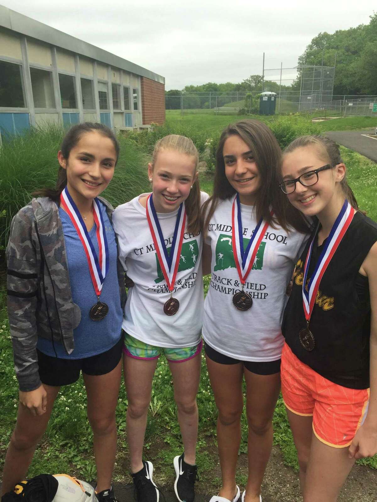 From left to right, Alexandra Klein, Daniela Pompa, Bianca Granitto and Gigi Barter of Western Middle School placed fifth in the 4x400 relay race.