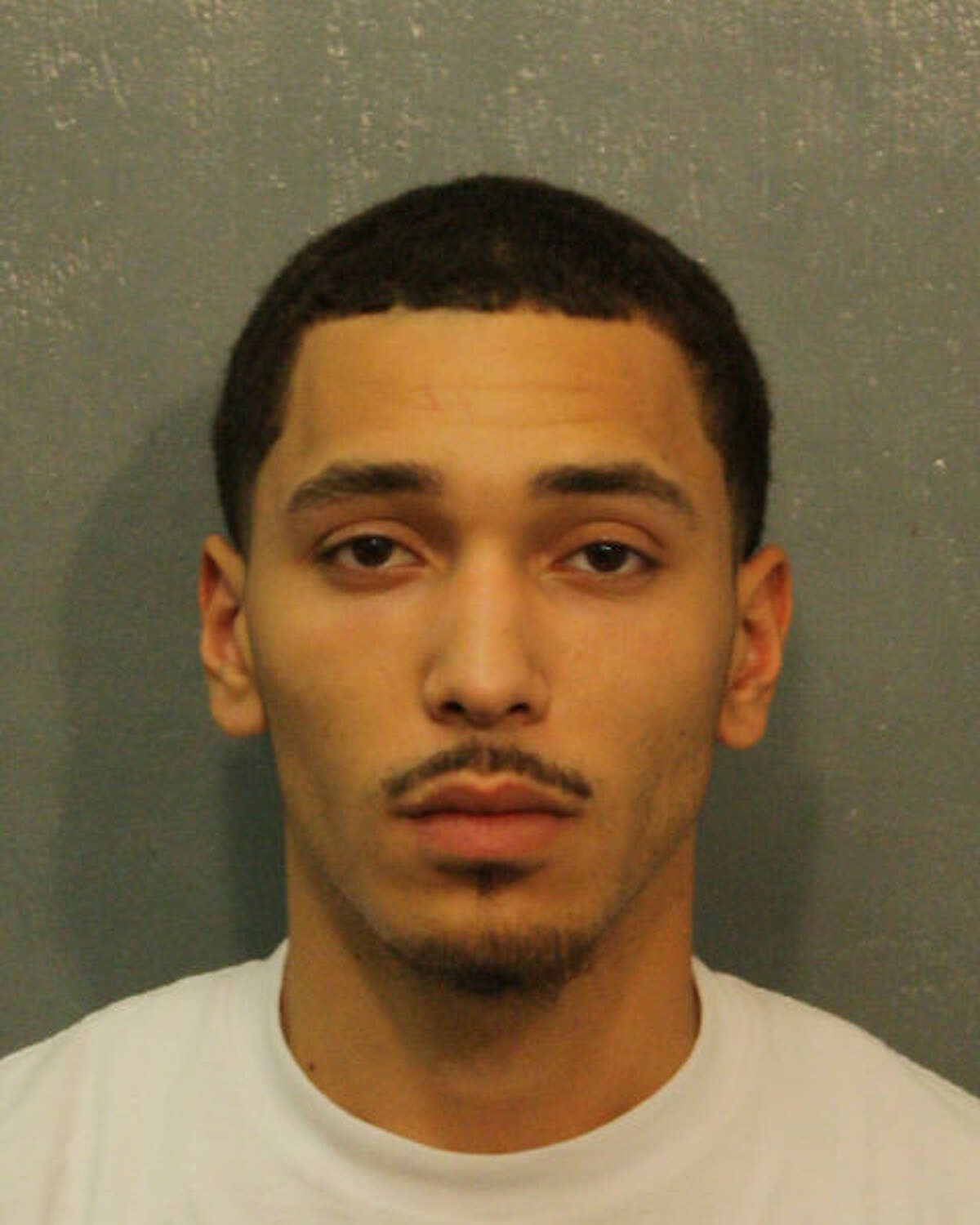 FILE - A mugshot of Tyrin Deon Robertson. 20. Robertson is accused of shooting and killing a 16-year-old boy in northeast Harris County, Texas on June 4, 2017.