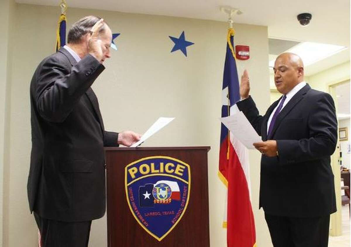 Police Chief Ray Garner sworn in Pete Arredondo as captain for the United ISD Police Department on Monday.  