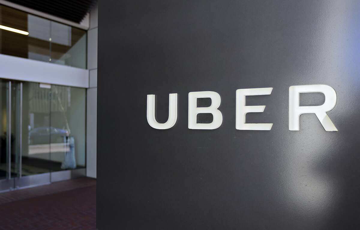 FILE- This March 1, 2017, file photo shows an exterior view of the headquarters of Uber in San Francisco. Uber has fired more than 20 employees after a law firm investigated complaints of sexual harassment, bullying, discrimination and other violations of company policies. An Uber spokeswoman says the firm Perkins Coie was hired after former engineer Susan Fowler posted a blog in February about sex harassment at the ride-hailing company. Fowler wrote that on her first day at work her boss propositioned her in a series of messages. (AP Photo/Eric Risberg, File)