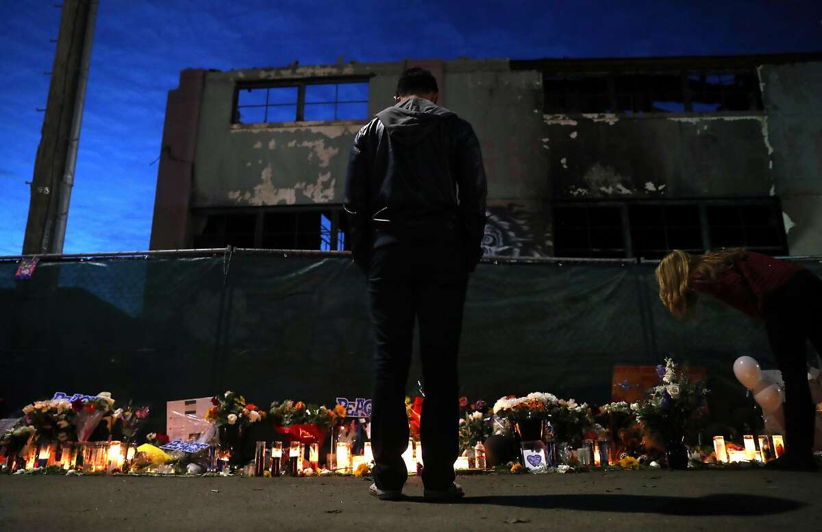 A memorial for fire victims in front of the Ghost Ship warehouse on 31st Avenue in Oakland, on December 12, 2016.