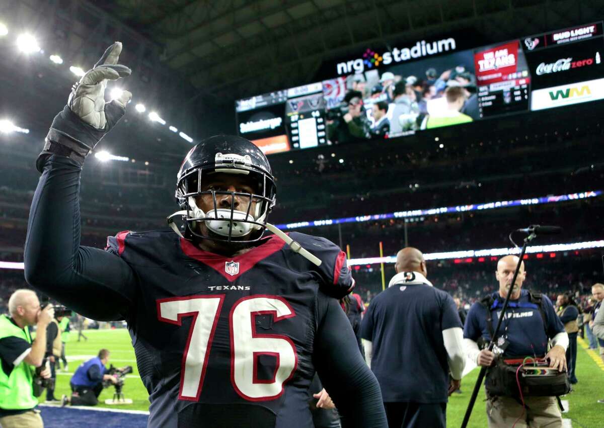 Houston Texans tackle Duane Brown (76) waves to the fans as he leaves the field after the Texans 27-14 win over the Oakland Raiders in an AFC Wild Card Playoff game at NRG Stadium on Saturday, Jan. 7, 2017, in Houston. ( Brett Coomer / Houston Chronicle )