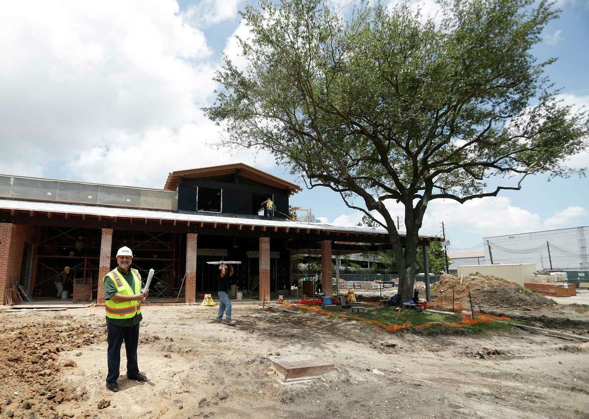 George Mickelis, owner of Cleburne Cafeteria at 3606 Bissonnet, stands in front the new Cleburne Cafeteria, Tuesday, June, 6, 2017. The 76 year old cafeteria is preparing to reopen in a new, larger building in August after being destroyed by fire April 26, 2016. The new space, with more than 11,000 square feet, will keep a nostalgic feel, with the same cafeteria where longtime customers will feel comfortable, but have a fresh look that will appeal to younger customers as well. They will be adding beer, wine and steaks to their other items. ( Karen Warren / Houston Chronicle )