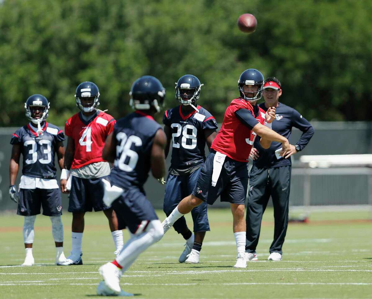 Houston Texans quarterback Tom Savage (3) throws a pass to running back Lamar Miller (26) during the Houston Texans OTAs at the Methodist Training Center in Houston, TX on Tuesday, May 23, 2017.