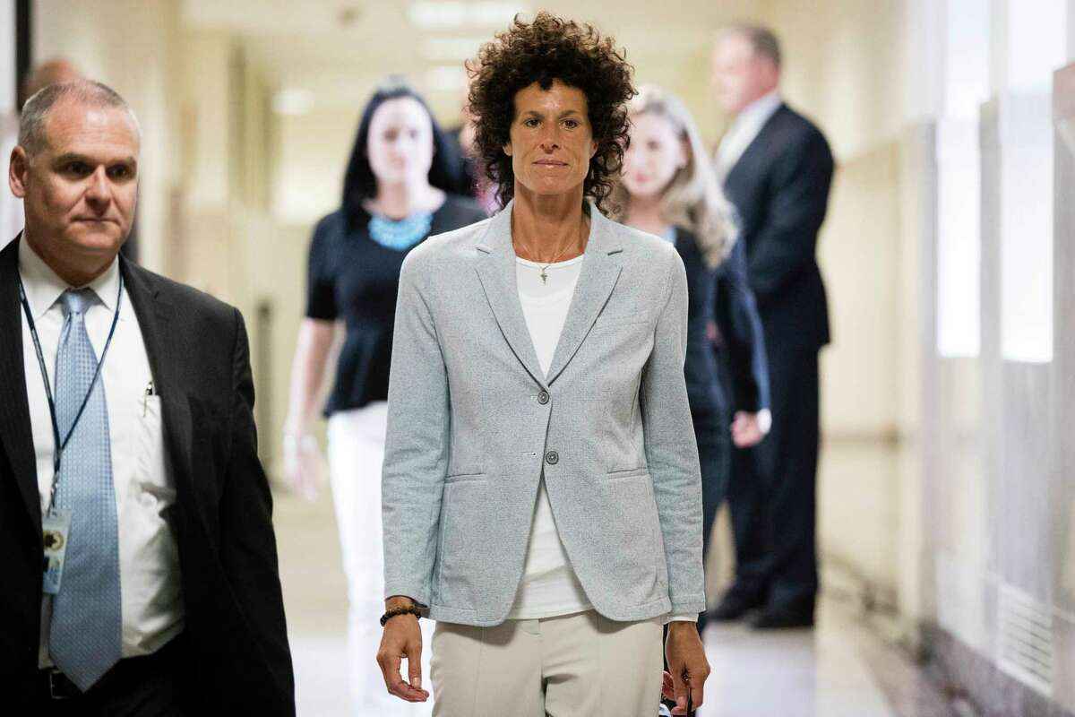 Andrea Constand walks to the courtroom during Bill Cosby's trial Tuesday, June 6. Cosby is accused of drugging and sexually assaulting Constand at his home outside Philadelphia in 2004.