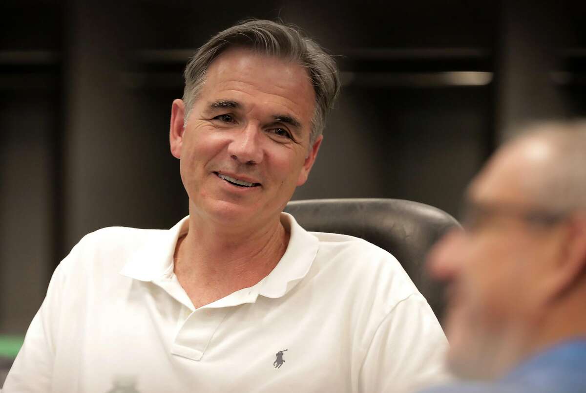 Oakland Athletics' vice president of baseball operations, Billy Beane prepares for the upcoming baseball draft as front office personnel and scouts gather in the war room to look over players, at the Oakland Coliseum on Tuesday June 6, 2017, in Oakland, Ca.