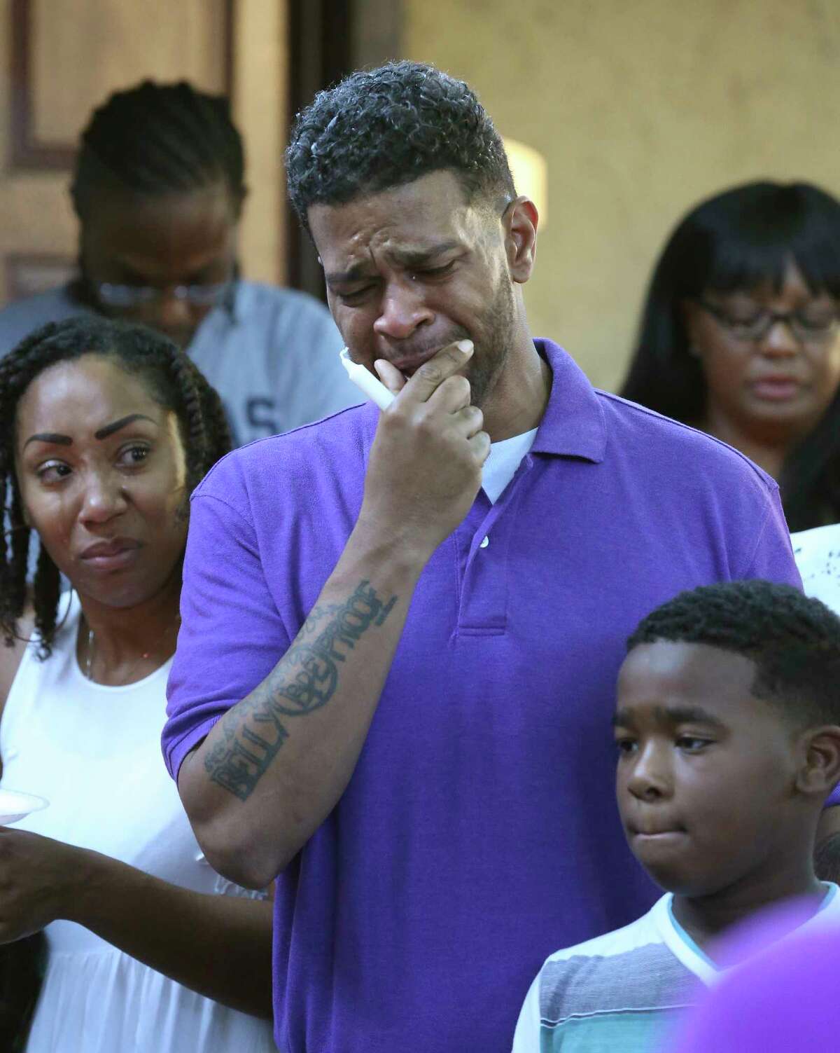 Quincy Russell struggles with grief as friends and family gather on June 6, 2017 to remember, in a prayer vigil, April Russell who was fatally shot by her ex boyfriend on on Monday.