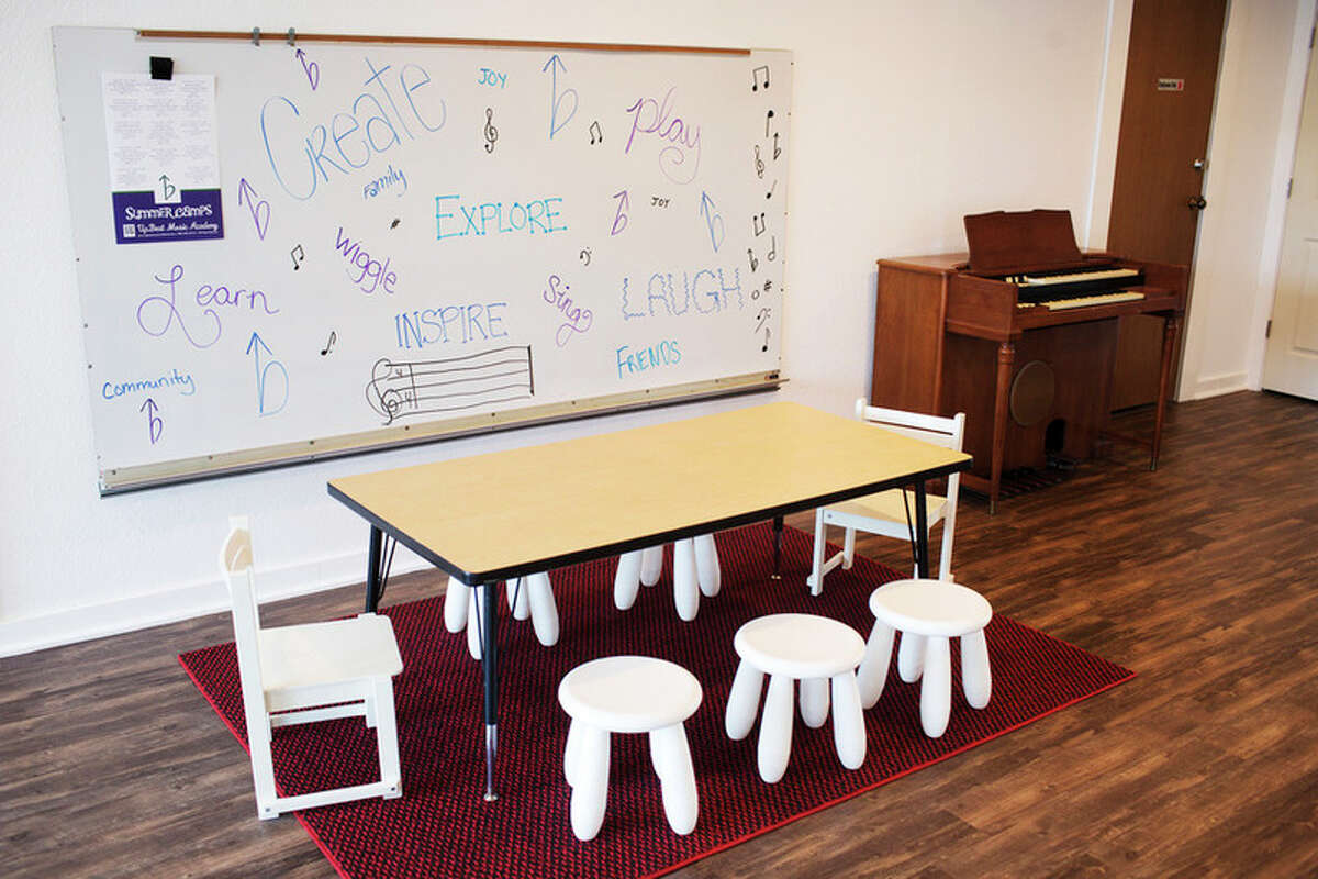 THEOPHIL SYSLO | For the Daily News A table, organ and white board seen inside of the new music school UpBeat Music Academy on Thursday.