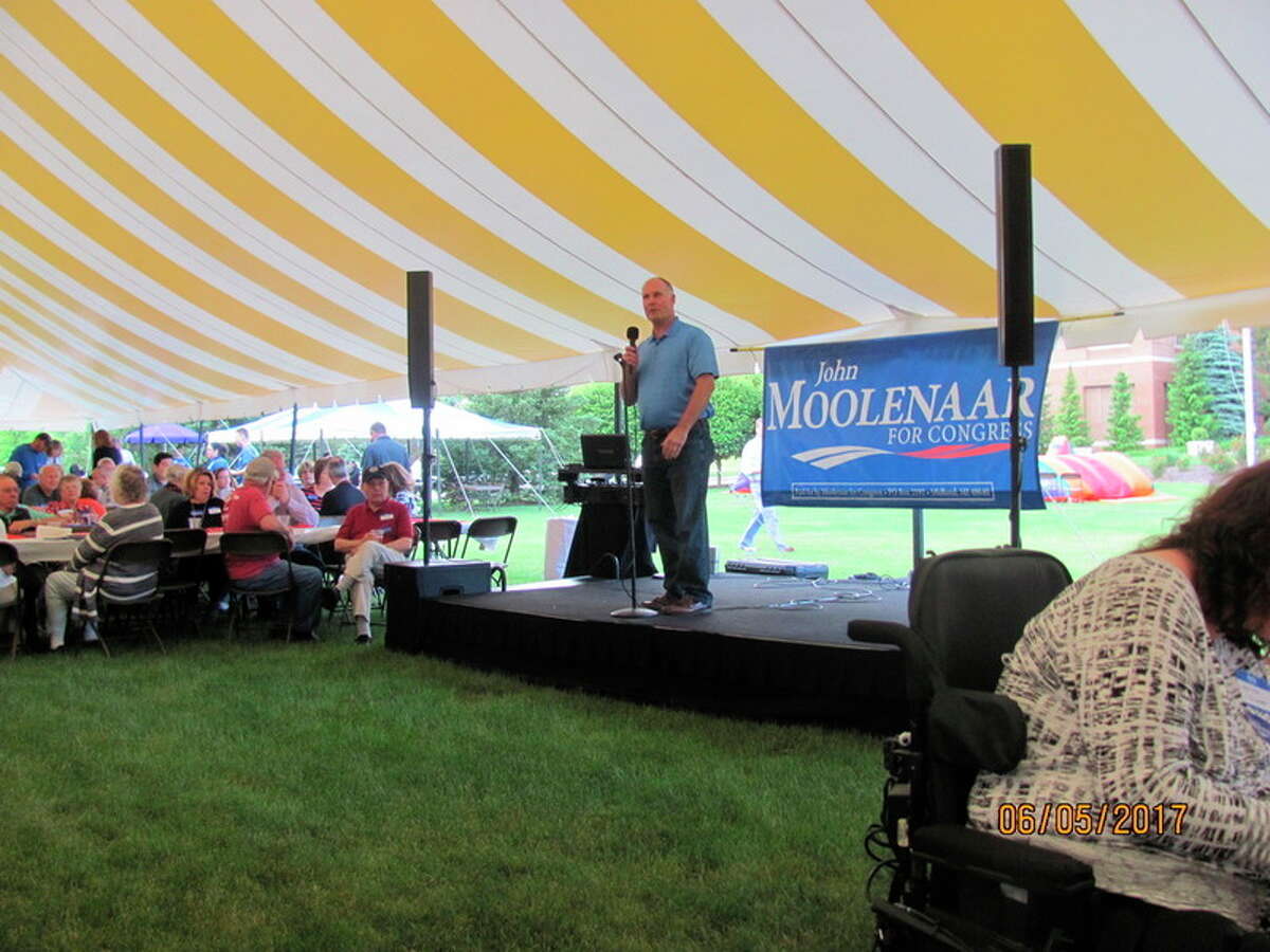 Rep. John Moolenaar speaks to supporters at the annual Picnic at the Tridge on Monday.