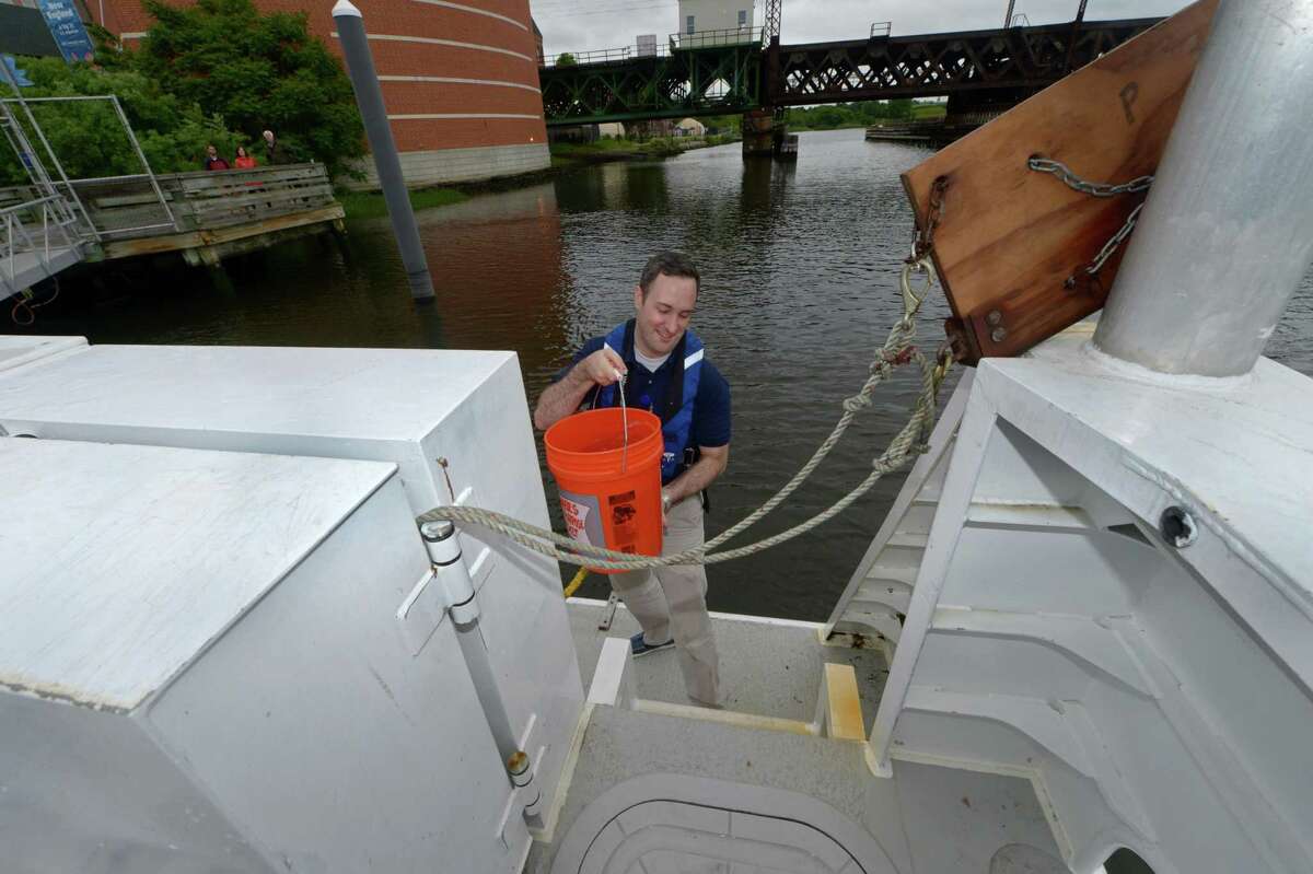 Maritime Aquarium research scientist Dave Hudson demonstrates the testing the groups will conduct as part of the Unified Water Study organized by Save the Sound during a press conference Tuesday, June 6, 2017, on the Aquarium's Research vessel, Spririt of the Sound, at the aquarium in Norwalk, Conn. This is the first time disparate water studies conducted by local water quality NGOs will be coordinated under one organizational effort.