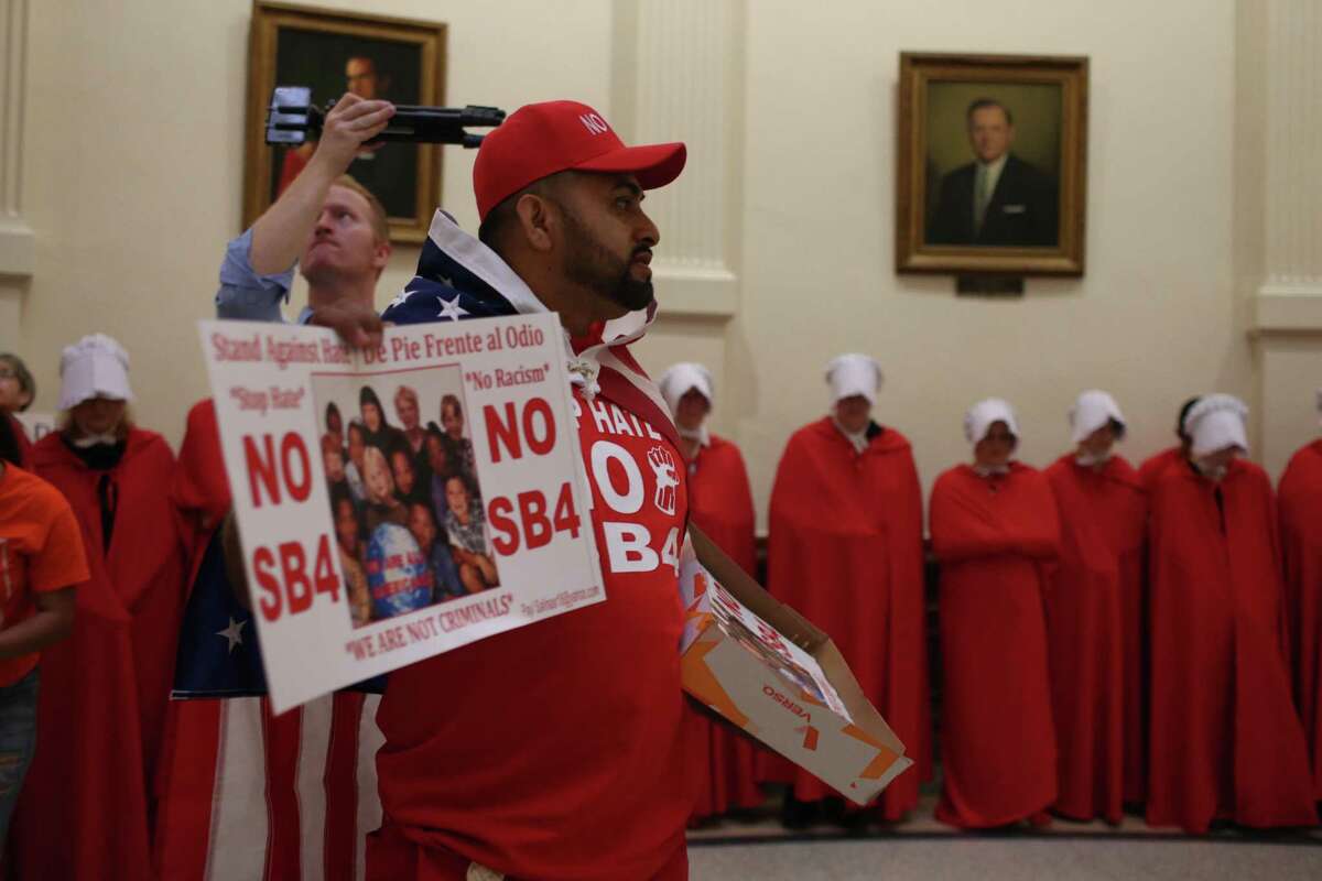 Opponents of SB 4 protest at the Capitol last month in Austin. Hundreds of people are expected to assemble in protest of the law, and possibly some counterprotesters, outside of a federal court hearing over SB 4 set for Monday, officials said.